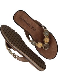 Bruine suède teenslippers met bewerkte cirkelaccenten in goud, zilver en crème, met een textuur rubberen zool voor grip.
