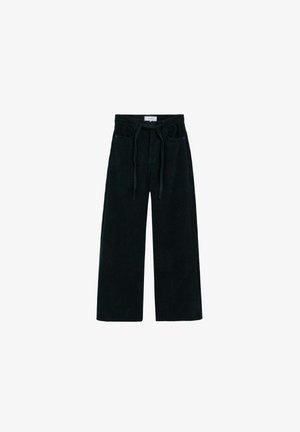 Pantalones de pana negros con un corte holgado, piernas anchas y cinturilla con cordón ajustable. Presenta bolsillos frontales y tela texturizada.