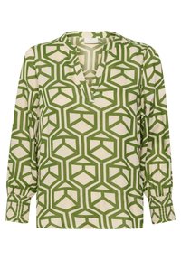 Blouse à manches longues avec un motif géométrique en hexagone vert sur fond beige, décolleté en V avec petit col montant et poignets froncés.