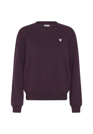 Tumevioletne pikkade varrukatega pahempidi kampsun, millel on soonilised kätised ja alumine ääreosa ning peal vasakul rinnal väike helesinine süda.