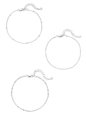 Three silver bracelets featuring different designs: one with beads, one twisted, and another with smooth links. All include adjustable chains.