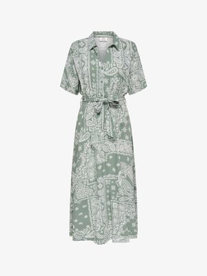 Vihreä midimekko valkoisella paisley-kuosilla, lyhyillä hihoilla, kauluksella ja kankaalla sidottu vyö vyötäröllä.
