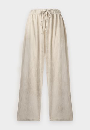 Beige viddebenbukser med elastisk talje og snøre, lavet af tekstureret letvægtsstof.