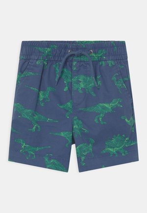 Granatowe dziecięce szorty z zielonymi wzorami dinozaurów, elastyczną talią, sznurkiem ściągającym oraz bocznymi kieszeniami.