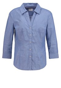 Blå skjorta med krage, långa ärmar och två bröstfickor. Tyget har ett subtilt strukturerat mönster.