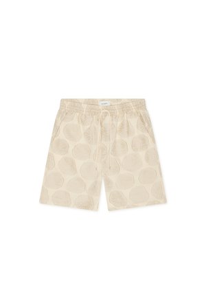 Short beige taille élastique avec cordon de serrage et motif floral subtil, longueur genou avec poches latérales.