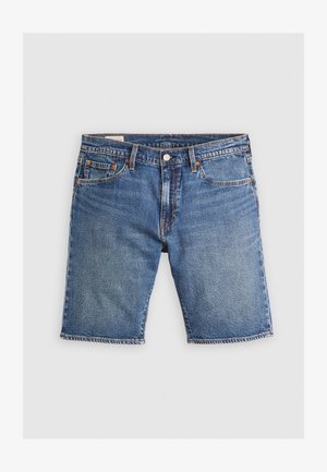 Keskmise sinise pesu denim lühikesed püksid, sirge lõikega, viie taskuga ja kontrastse oranži õmblusega. Alumine serv on lõhestatud.