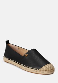 Sorte skinners i lær med espadrille-lignende jutesåle, rund tå og gulllogo på overdelen. Glatt tekstur og minimalistisk design.