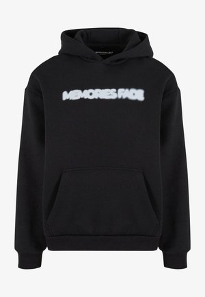 Black hooded sweatshirt features a front pouch pocket, ribbed cuffs, and a fuzzy white graphic text "MEMORIES FADE" across the chest.
