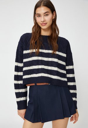 - Sweter