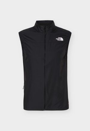 Fekete ujjatlan mellény elülső cipzárral és magas gallérral, a The North Face logóval a bal felső mellrészen, könnyű kültéri viselet.