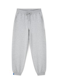 Szare spodnie dresowe wykonane z miękkiego materiału, z elastycznym pasem ze sznurkiem, bocznymi kieszeniami oraz ściągaczami przy kostkach.