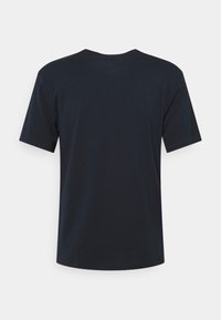 Marineblå bomulds T-shirt med korte ærmer, rund hals og en glat tekstur. Har et enkelt, udekoreret design uden mønstre.