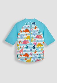 Plavi kratki rash guard s uzorcima šarenih dinosaura i morskog života na prugastoj pozadini. Zatvaranje na zip s leđa.