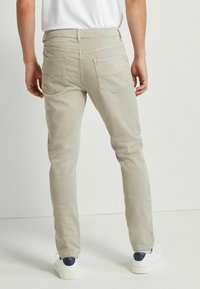 Next AUTHENTIC - Traperice suženog kroja - grey
