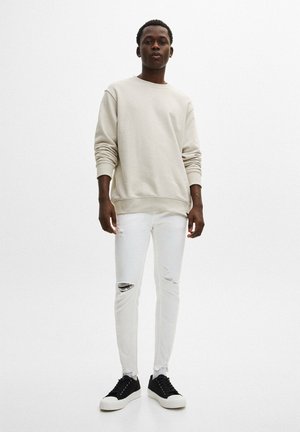 RIPPED CARROT FIT - Jeans slim fit - white