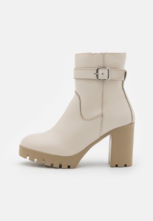 Stivaletti con tacco - beige