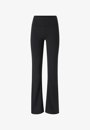 Black flared yoga pants made of elastic material. Features a high waist and a smooth texture, designed for comfort and flexibility.