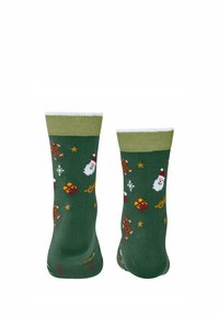 Calze verdi con un design a fantasia che presenta Babbo Natale, uomini di pan di zenzero, regali e fiocchi di neve. Composizione in misto cotone, con dettagli bianchi e verde oliva.