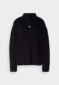 Pull noir en maille à manches longues avec un col montant et un petit logo Tommy Jeans brodé centré sous le col.