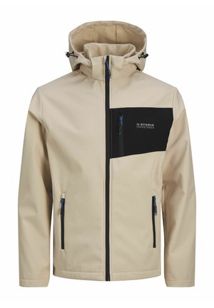 Beige takki mustalla rintataskulla, jossa on vetoketjusulku, säädettävä huppu ja siniset yksityiskohdat vetoketjuissa ja naruissa.