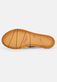 Suela de zapato de cuero marrón con textura suave, que presenta un patrón acanalado y costuras decorativas. Tamaño marcado como 37.