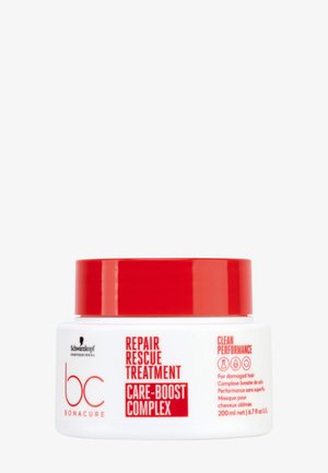 Vit cylindrisk burk med ett röd skruvlock. Text: "bc Bonacure Repair Rescue Treatment Care-Boost Complex," 200 ml kapacitet.