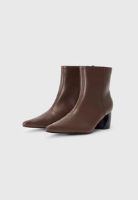 RAID DEBRA - Tronchetti - brown
