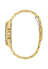 Guldfärgad metallklocka med länkarmband och rund klockkropp. Har en mörk urtavla med silverdetaljer och en texturerad bezel.