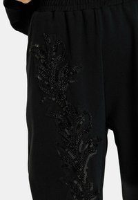 Alma en Pena Pantalones deportivos - nero