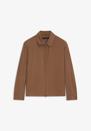 Veste marron zippée avec col pointu et poches latérales, présentée à plat sur un fond blanc.