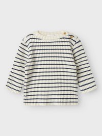 Długi sweter z dzianiny o kremowym kolorze z granatowymi poziomymi paskami. Posiada prążkowaną fakturę oraz dwa drewniane guziki na ramieniu.