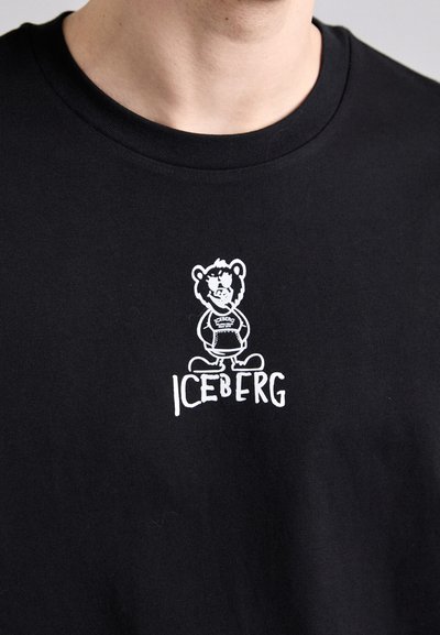 T-shirt en coton noir avec un graphique d'ours blanc et du texte "ICEBERG". Encolure ronde et manches courtes. Texture lisse.
