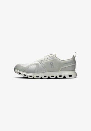 Light gray and white athletic sneaker with cushioned segmented sole and lace-up closure, featuring a mesh upper and logo on the side.