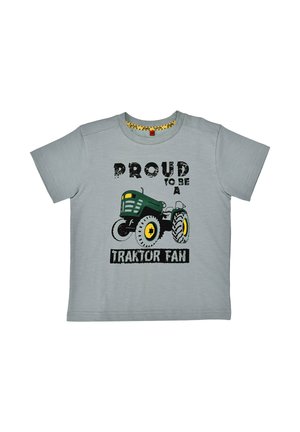 Light gray short-sleeve t-shirt with a green tractor illustration and the text "Proud to be a Traktor Fan" in black distressed font.