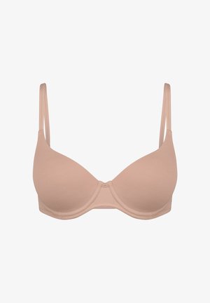 Nude-colored, lightly padded underwire bra with double thin adjustable shoulder straps and smooth seamless cups.