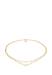 Collana a strati in oro con due catene, arricchita da perline circolari e un'accensione a forma di stella sulla catena inferiore. Finitura liscia e lucida.