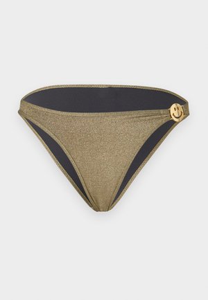 Slip bikini glitter oro con fodera interna nera e piccolo ciondolo oro a forma di faccina sorridente sul fianco destro della vita.