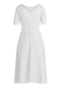 White dress featuring a lace bodice with short sleeves, a V-neckline, and a flowing skirt. The fabric is smooth and lightweight.