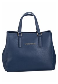 Marinblå handväska i skräddarsydd läder med två topphandtag, guldfärgad logodetalj, strukturerad form och minimalistisk design.