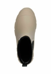 Bottine en caoutchouc beige avec tige texturée, panneaux latéraux élastiques et une languette à l'arrière. Présente un intérieur noir rembourré.