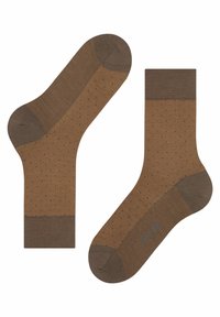 Brown socks featuring a herringbone pattern with darker accents. Made of a soft material with a contrasting cuff and heel detail.