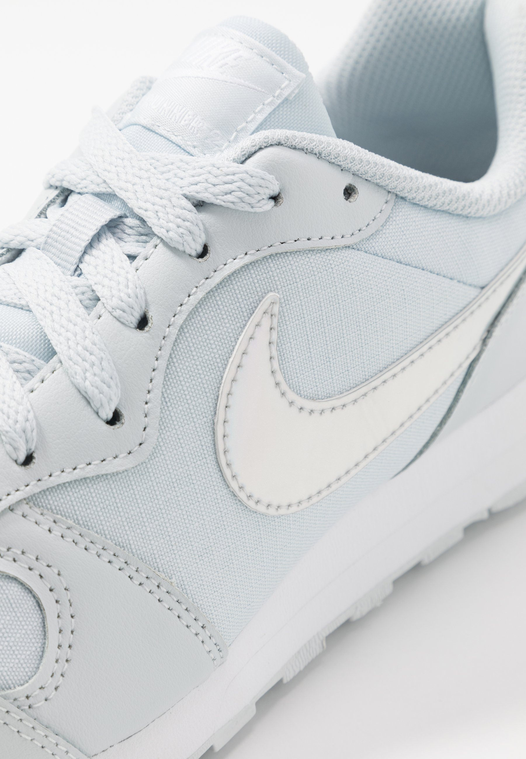 tênis nike new balance feminino