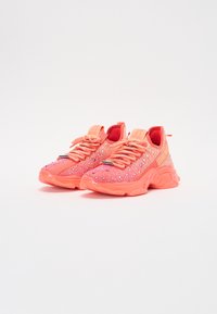 Scarpe sportive neon rosa con dettagli glitter, tomaia in rete testurizzata, suole imbottite e design con laccetti. Suola in gomma con motivo di trazione.