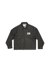 Black denim jacket with a zip front, pointed collar, two large front pockets, and a small patch label on the left chest area.