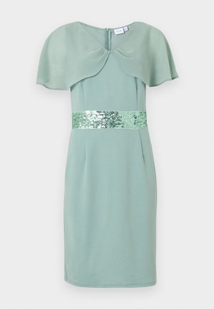 Robe mi-longue vert menthe avec des manches courtes fluides et une ceinture brillante ornée de paillettes à la taille, dotée d'une fermeture éclair au dos.