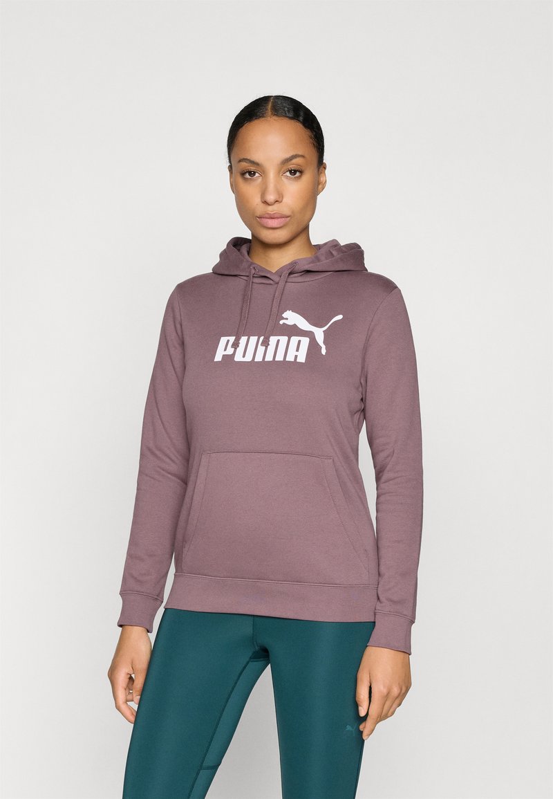 Bordo mikina s kapucňou, obsahujúca klokanie vrecko, šnúrku na kapucni a veľké biele logo Puma cez hruď. Hladká tkanina s dlhými rukávmi.