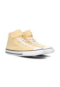 Geel canvas hoge sneakers met witte veters, zwarte streep op de zool en klittenbandsluiting voor een veilige pasvorm. Rubberen teenkap detail.