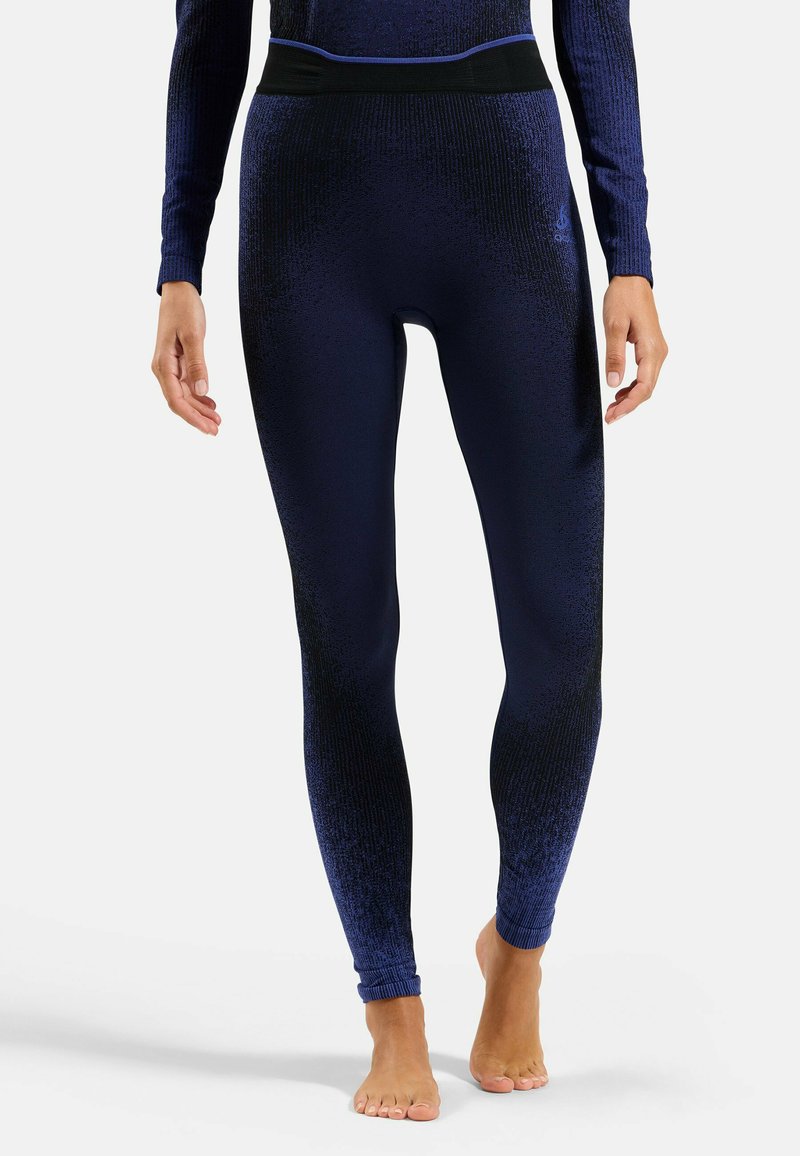 Navyblaue Leggings mit einem strukturierten Muster, einem hohen Bund mit schwarzem Akzent und einem figurbetonten Design.
