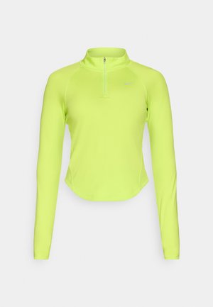 T-shirt de sport à manches longues en néon jaune vif, design à demi-zip, tissu extensible, forme ajustée, avec un petit logo sur la poitrine.